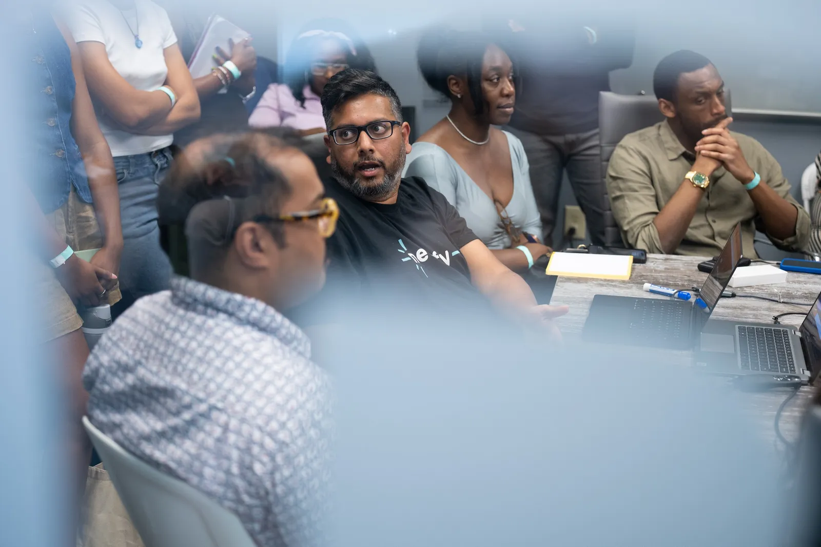 Karthik Puvvada listening in during a session at Atlanta Tech Week